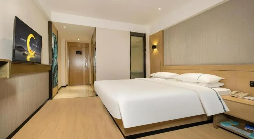 Bed in City Comfort Inn Wuzhou Municipal Government Vocational College
