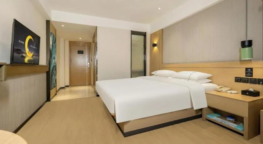 Bed in City Comfort Inn Wuzhou Municipal Government Vocational College