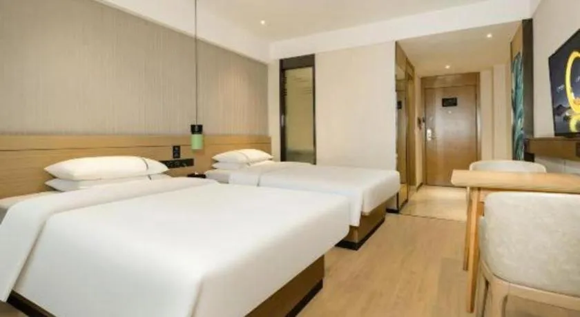 Bed in City Comfort Inn Wuzhou Municipal Government Vocational College