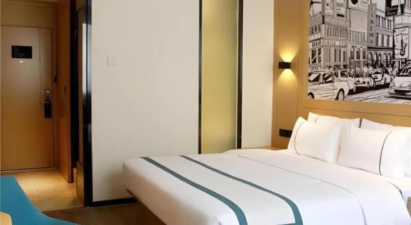 Bed in City Comfort Inn Yingcheng Walking Street