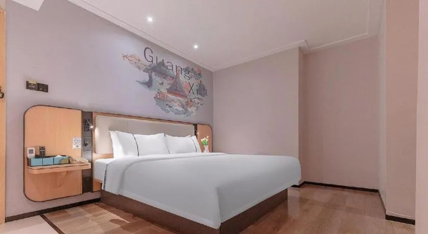 Bed in City Comfort Inn Liuzhou High-speed Railway Station