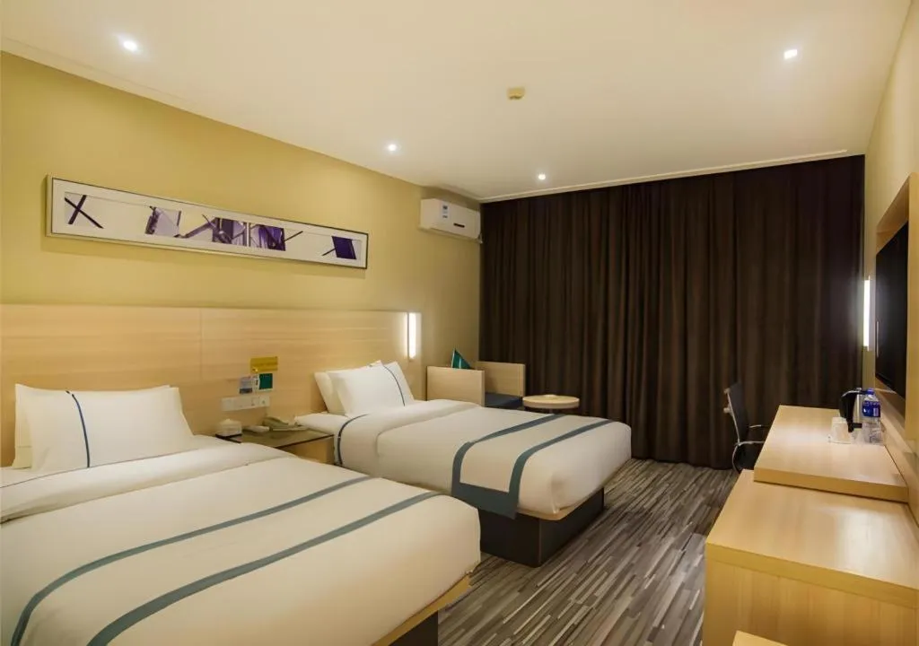 Bed in City Comfort Inn Liuzhou High-speed Railway Station