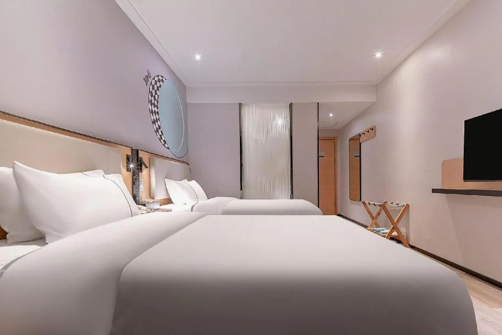 Bed in City Comfort Inn Liuzhou High-speed Railway Station