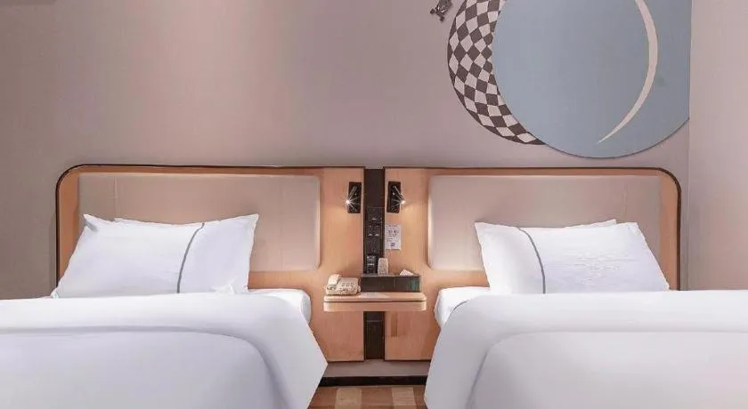 Bed in City Comfort Inn Liuzhou High-speed Railway Station