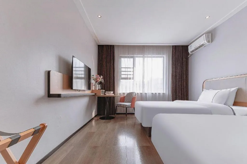 Bed in City Comfort Inn Liuzhou High-speed Railway Station