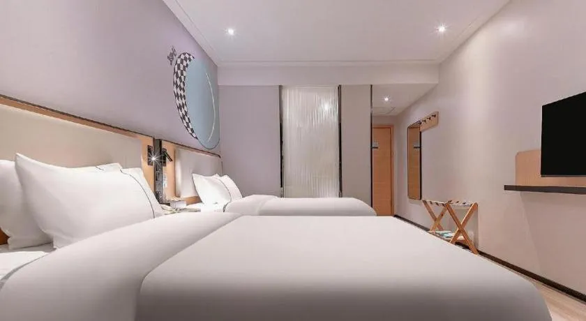 Bed in City Comfort Inn Liuzhou High-speed Railway Station