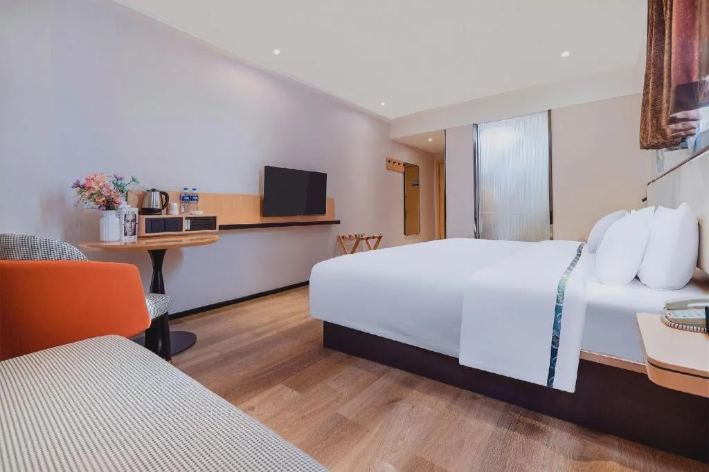 Bed in City Comfort Inn Liuzhou High-speed Railway Station