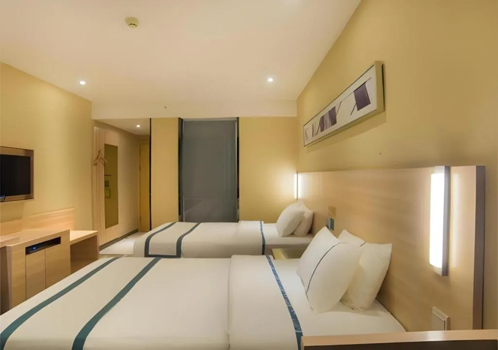 Bed in City Comfort Inn Liuzhou High-speed Railway Station