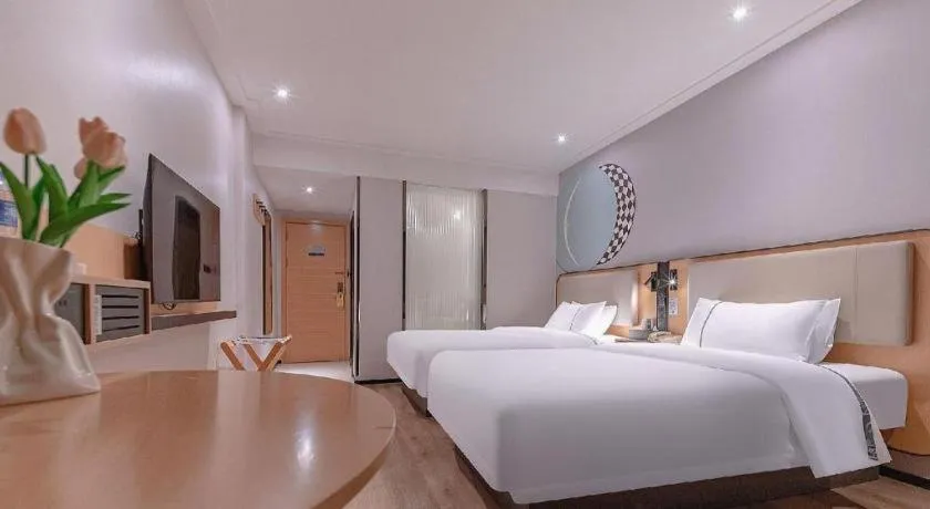 Bed in City Comfort Inn Liuzhou High-speed Railway Station