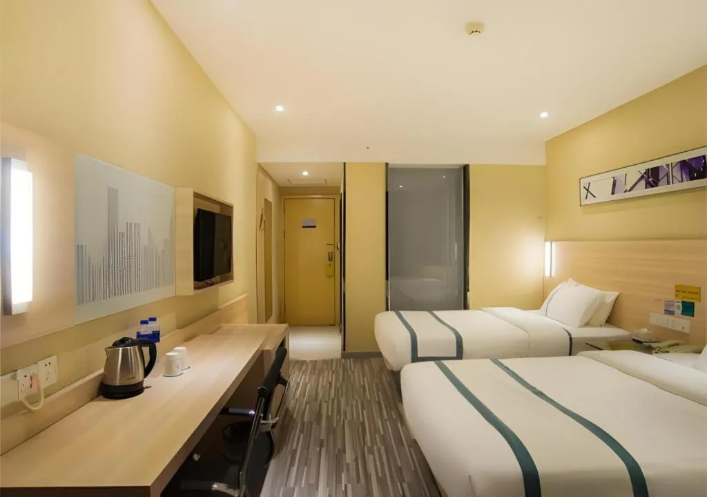 Bed in City Comfort Inn Liuzhou High-speed Railway Station