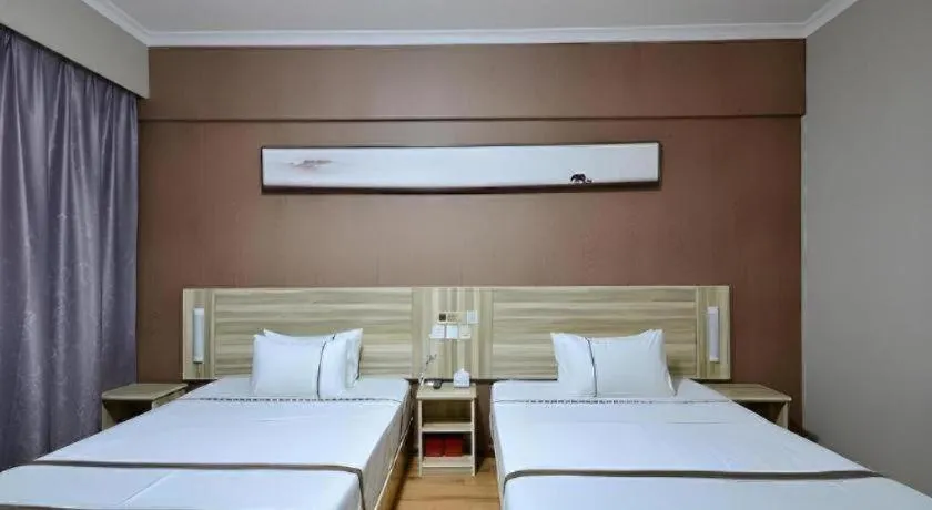 Bed in JTour Inn Wuchang Zhongnan University of Economics and Law