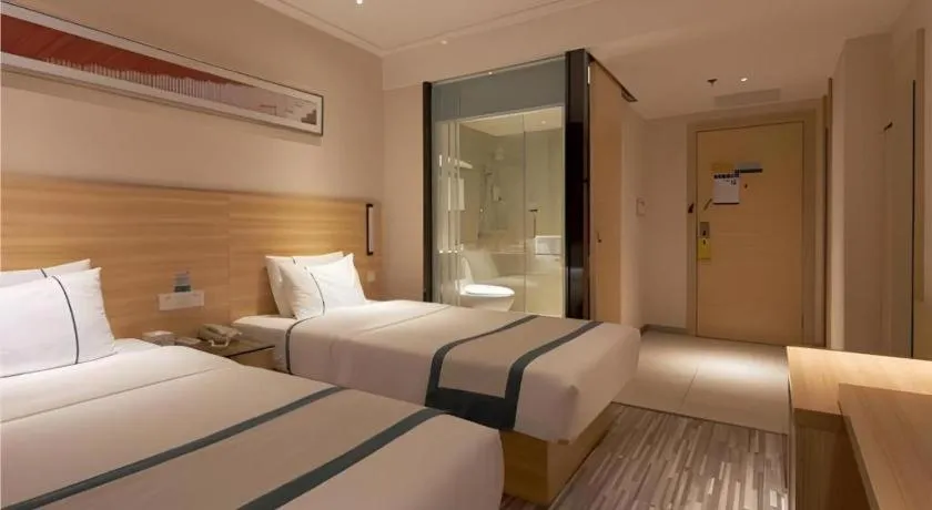 Bed in City Comfort Inn Liuzhou Wuxing Walking Street