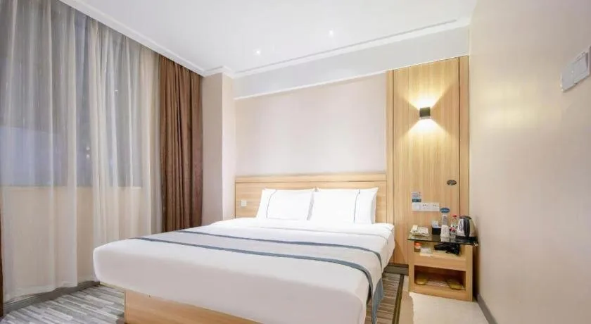 Bed in City Comfort Inn Liuzhou Wuxing Walking Street