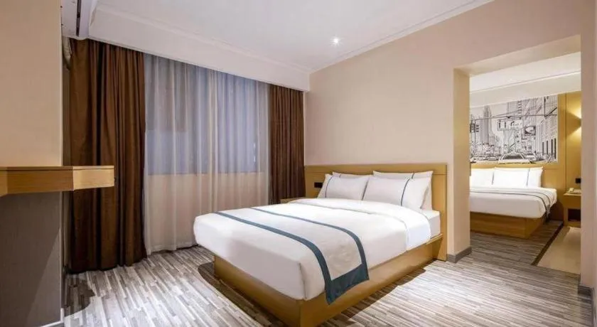 Bed in City Comfort Inn Liuzhou Wuxing Walking Street