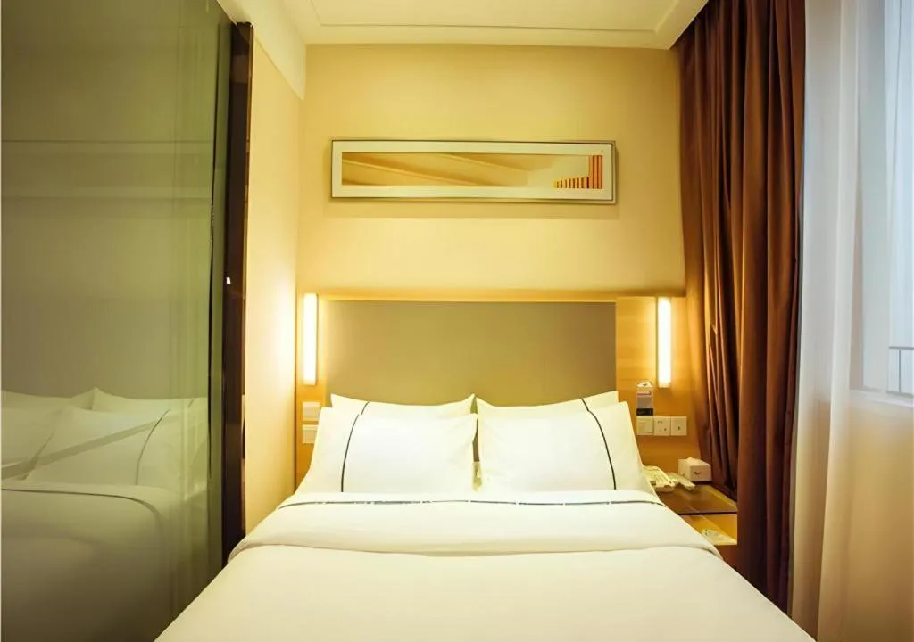 Bed in City Comfort Inn Wuzhou Bus Station