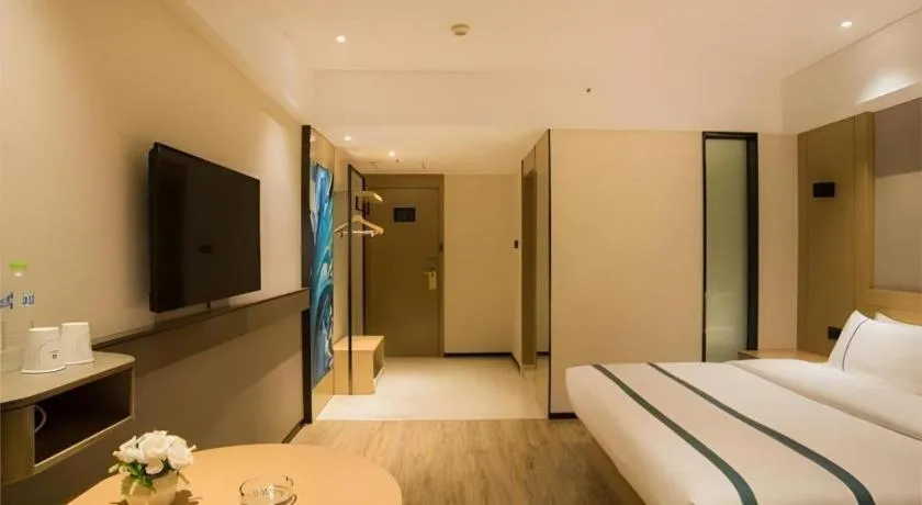 Bed in City Comfort Inn Liuzhou Wuxing Walking Street Zhonghuan Tower