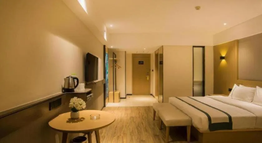 Bed in City Comfort Inn Liuzhou Wuxing Walking Street Zhonghuan Tower