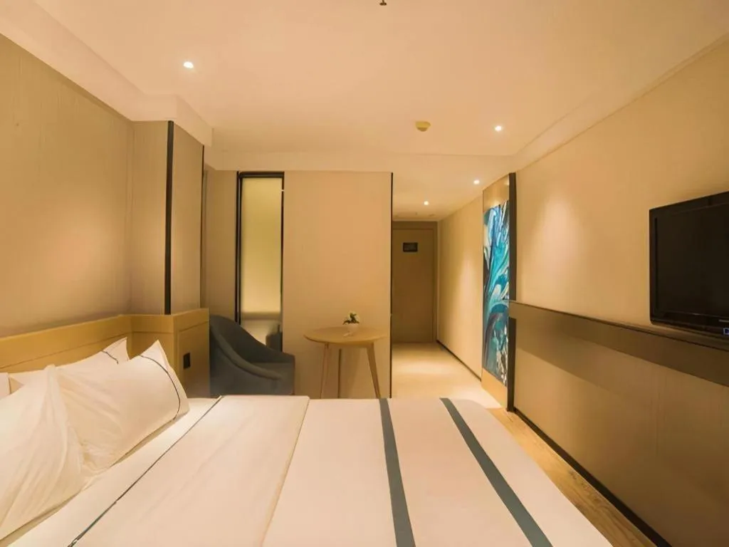 Bed in City Comfort Inn Liuzhou Wuxing Walking Street Zhonghuan Tower