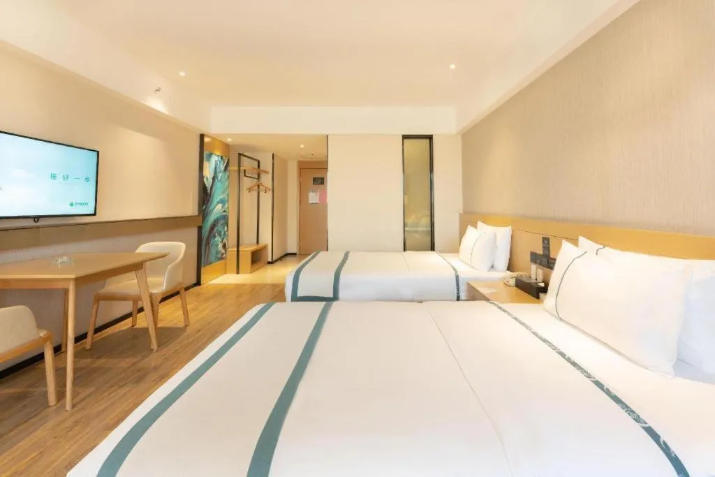 Bed in City Comfort Inn Liuzhou Wuxing Walking Street Zhonghuan Tower