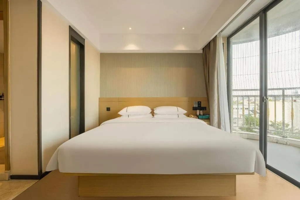 Bed in City Comfort Inn Liuzhou Wuxing Walking Street Zhonghuan Tower