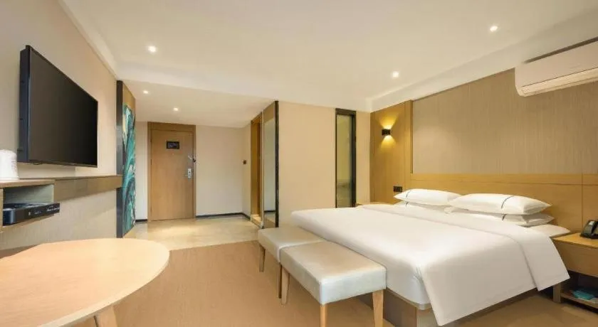 Bed in City Comfort Inn Liuzhou Wuxing Walking Street Zhonghuan Tower