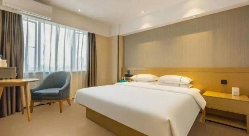 Bed in City Comfort Inn Liuzhou Wuxing Walking Street Zhonghuan Tower