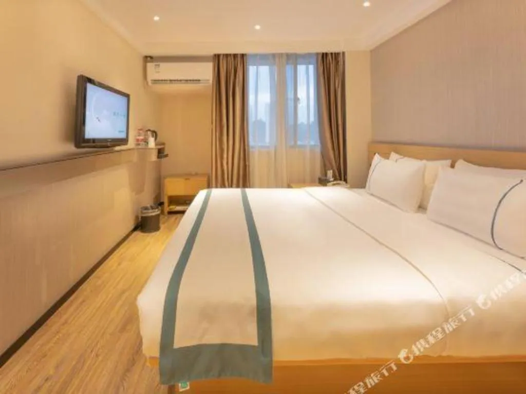 Bed in City Comfort Inn Liuzhou Wuxing Walking Street Zhonghuan Tower