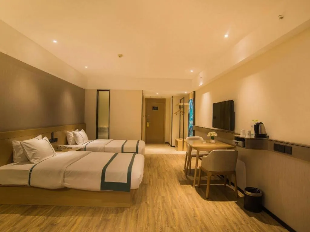 Bed in City Comfort Inn Liuzhou Wuxing Walking Street Zhonghuan Tower