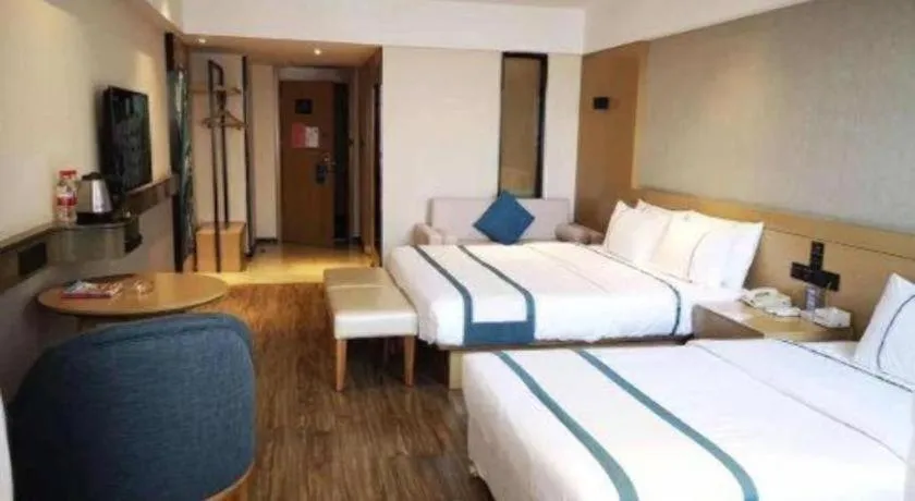 Bed in City Comfort Inn Liuzhou Wuxing Walking Street Zhonghuan Tower