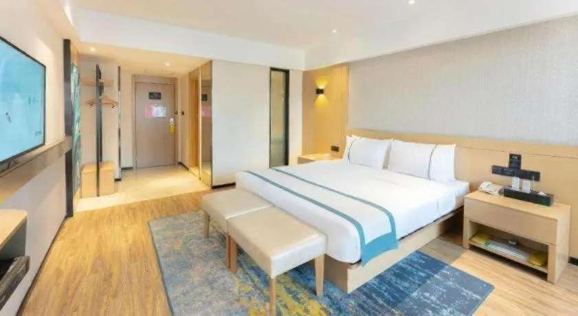 Bed in City Comfort Inn Liuzhou Wuxing Walking Street Zhonghuan Tower