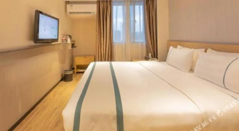 Bed in City Comfort Inn Liuzhou Wuxing Walking Street Zhonghuan Tower