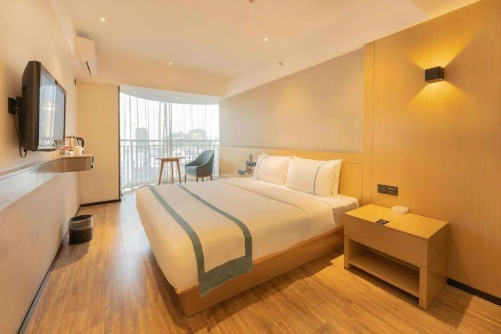 Bed in City Comfort Inn Liuzhou Wuxing Walking Street Zhonghuan Tower