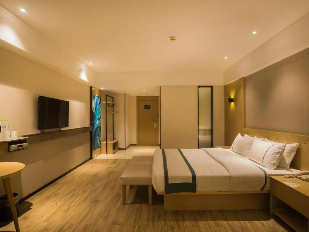 Bed in City Comfort Inn Liuzhou Wuxing Walking Street Zhonghuan Tower