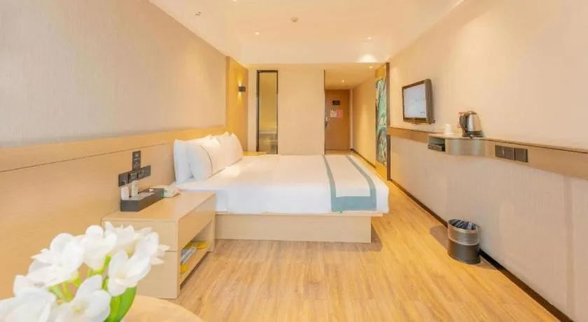 Bed in City Comfort Inn Liuzhou Wuxing Walking Street Zhonghuan Tower