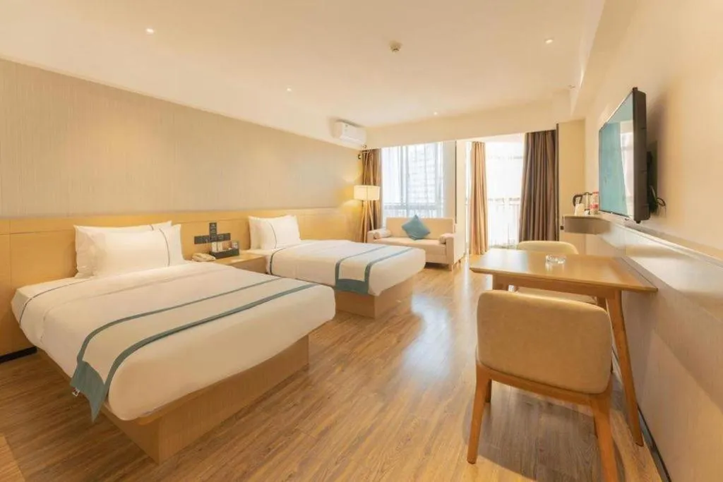 Bed in City Comfort Inn Liuzhou Wuxing Walking Street Zhonghuan Tower