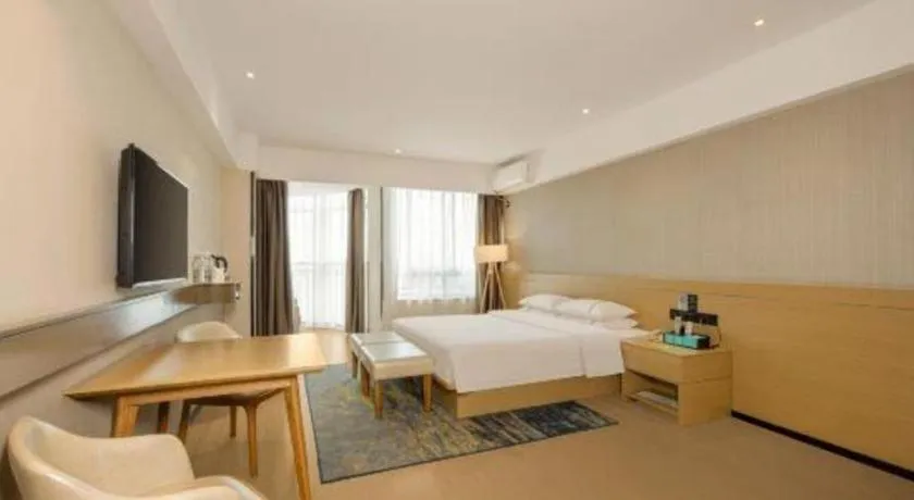 Bed in City Comfort Inn Liuzhou Wuxing Walking Street Zhonghuan Tower