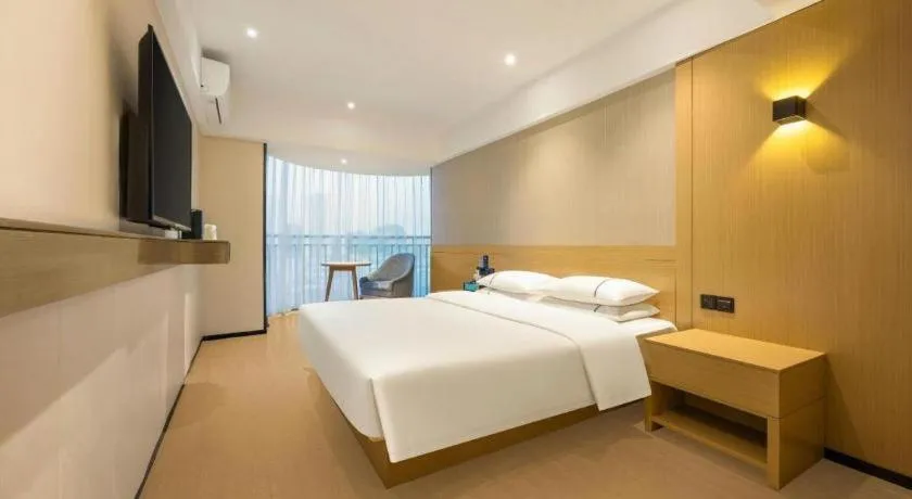Bed in City Comfort Inn Liuzhou Wuxing Walking Street Zhonghuan Tower