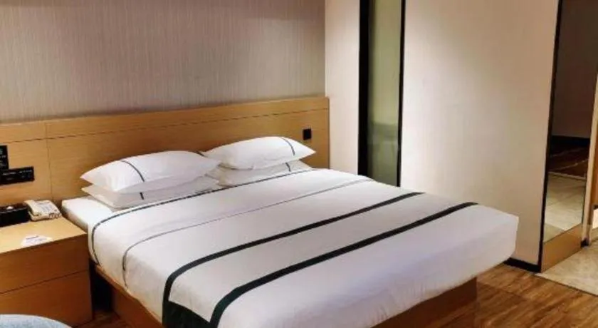 Bed in City Comfort Inn Liuzhou Wuxing Walking Street Zhonghuan Tower