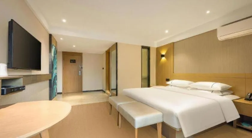 Bed in City Comfort Inn Liuzhou Wuxing Walking Street Zhonghuan Tower