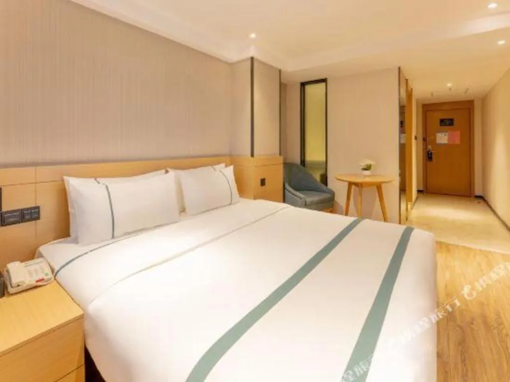 Bed in City Comfort Inn Liuzhou Wuxing Walking Street Zhonghuan Tower