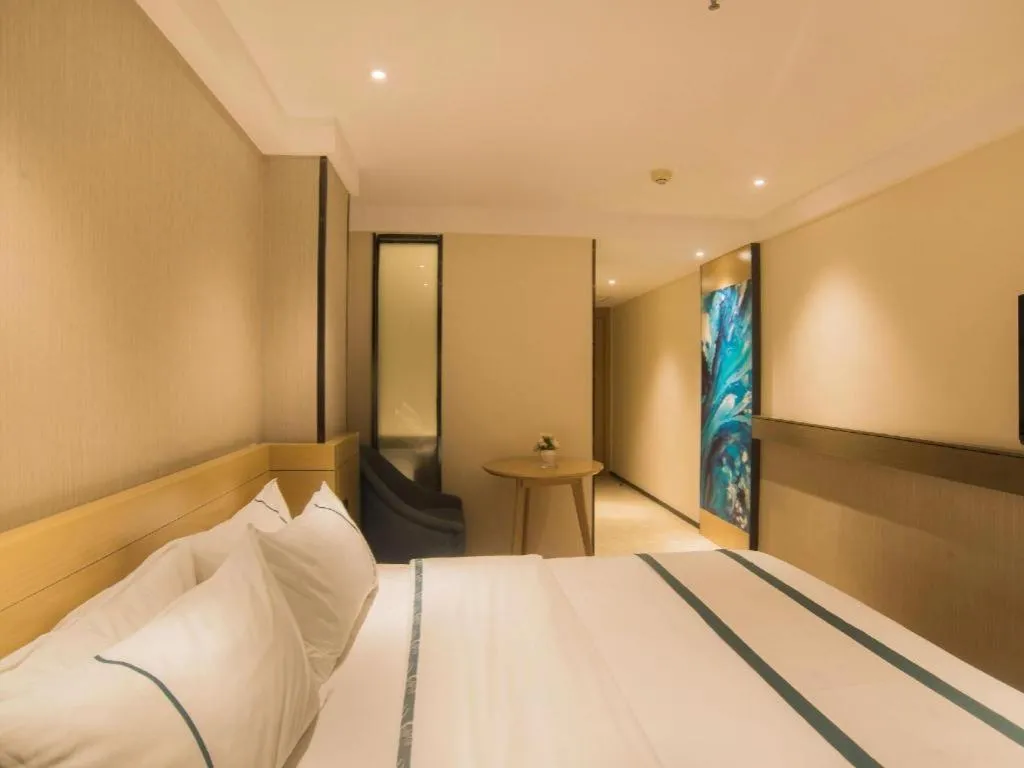 Bed in City Comfort Inn Liuzhou Wuxing Walking Street Zhonghuan Tower