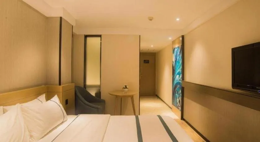 Bed in City Comfort Inn Liuzhou Wuxing Walking Street Zhonghuan Tower