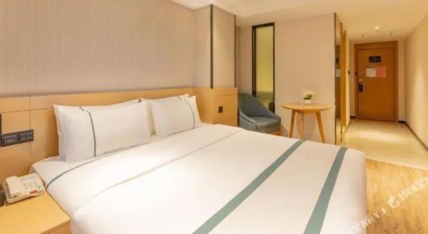 Bed in City Comfort Inn Liuzhou Wuxing Walking Street Zhonghuan Tower