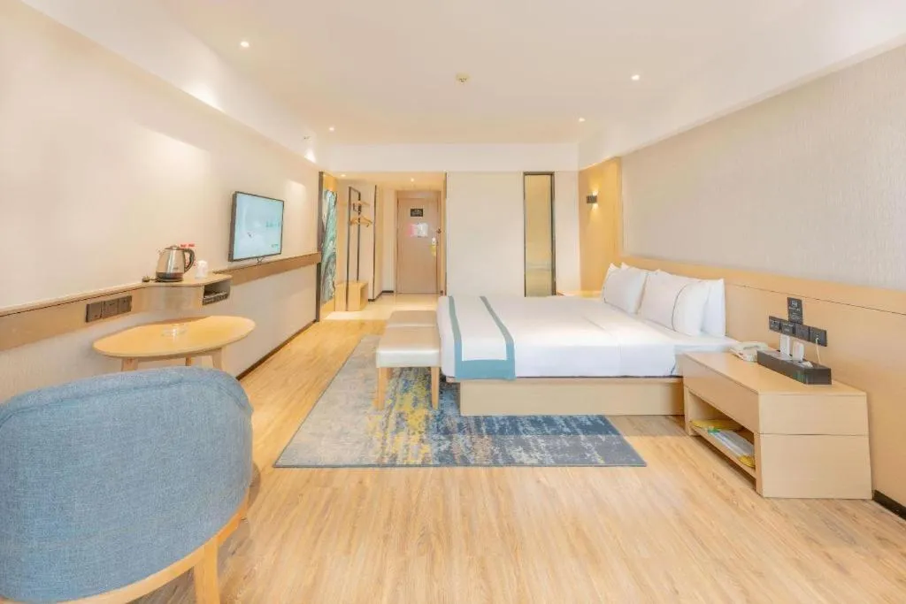 Bed in City Comfort Inn Liuzhou Wuxing Walking Street Zhonghuan Tower