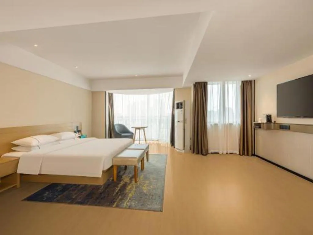 Bed in City Comfort Inn Liuzhou Wuxing Walking Street Zhonghuan Tower