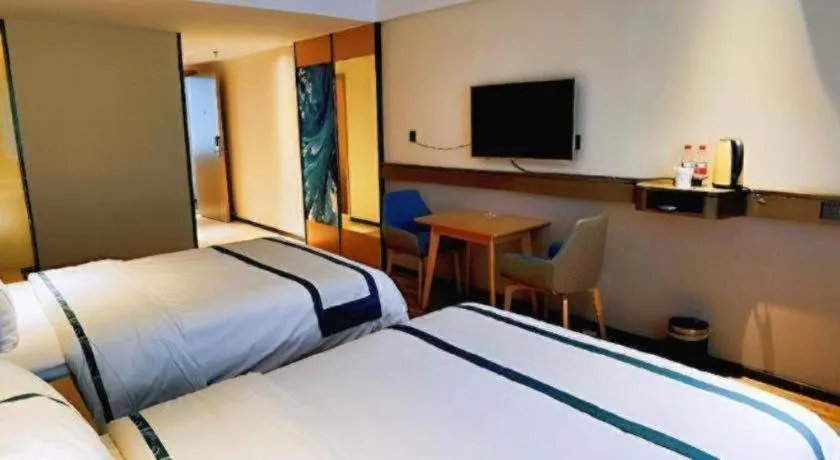 Bed in City Comfort Inn Hezhou Huangyao Ancient Town