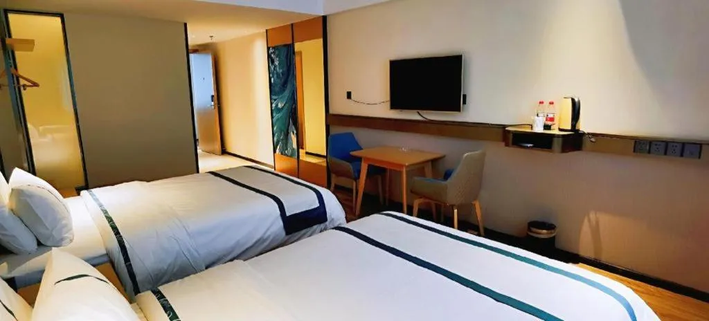 Bed in City Comfort Inn Hezhou Huangyao Ancient Town