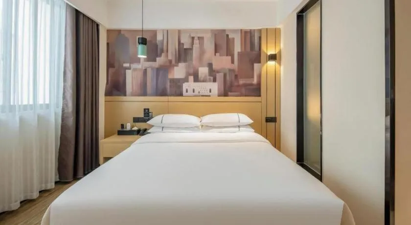 Bed in City Comfort Inn Hezhou Huangyao Ancient Town