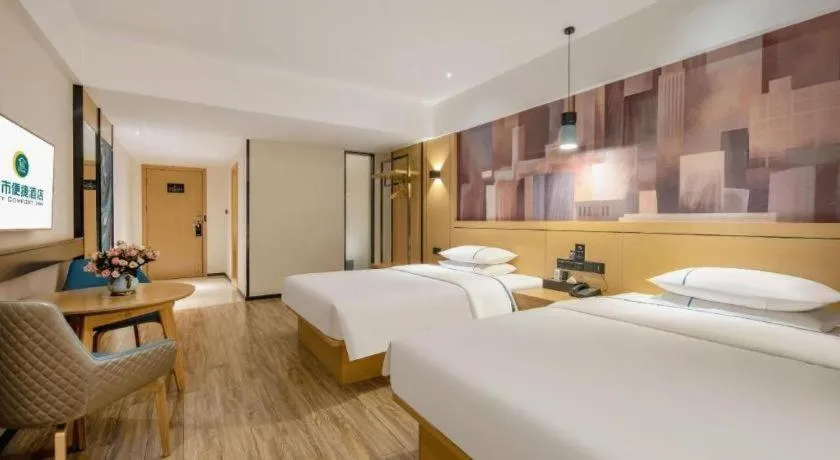 Bed in City Comfort Inn Hezhou Huangyao Ancient Town