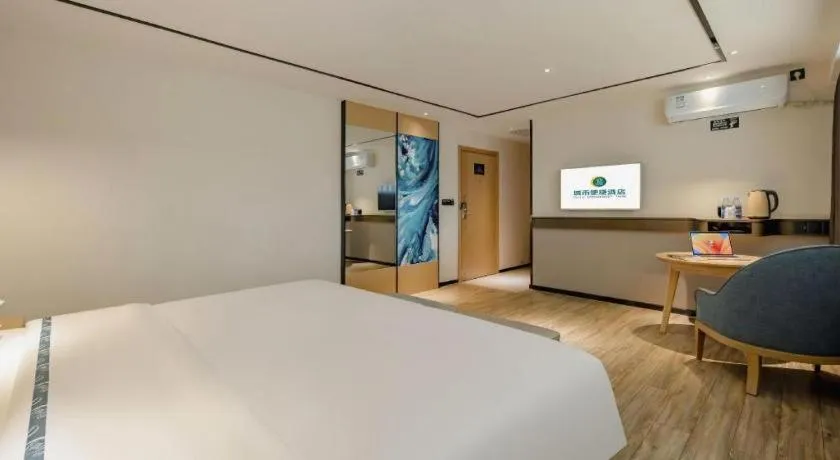 Bed in City Comfort Inn Hezhou Huangyao Ancient Town